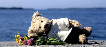 Teddy bear and summer flowers