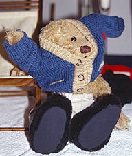 Teddy bear Greggan geting dressed after the bath