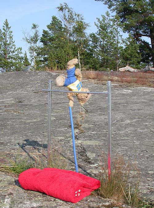 Greggan doing pole-vaulting jump